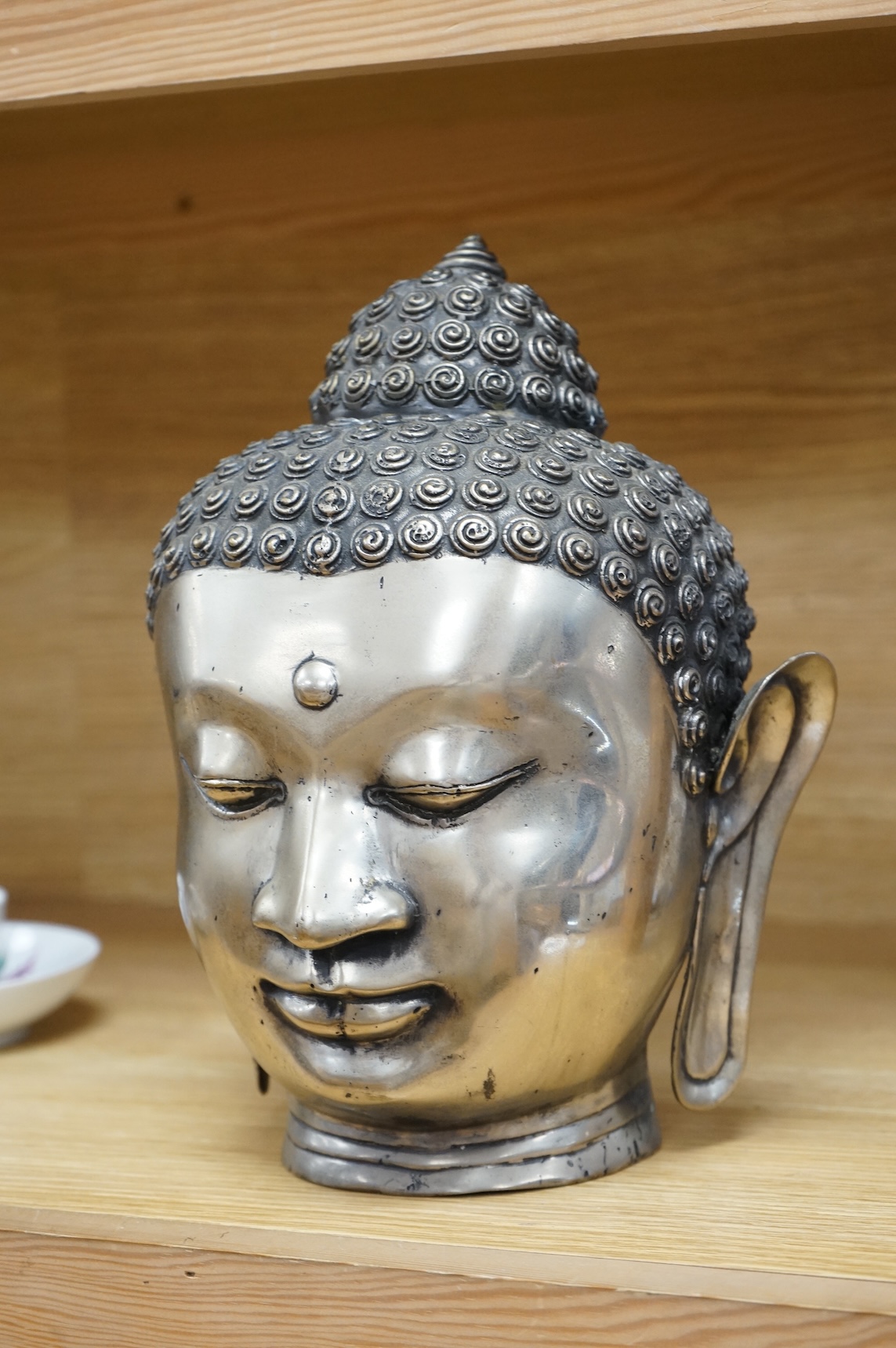 A Thai metal Buddha head, 27cm